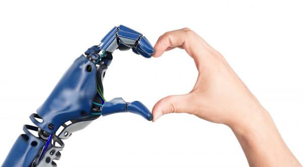 Robothand en mensenhand vormen hart voor TriFact365 en Unit4 Multivers Scan en Herken